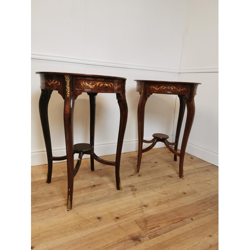 234 - Pair of inlaid kingwood lamp tables with ormolu mounts. {84 cm H x 66 cm Diam}.