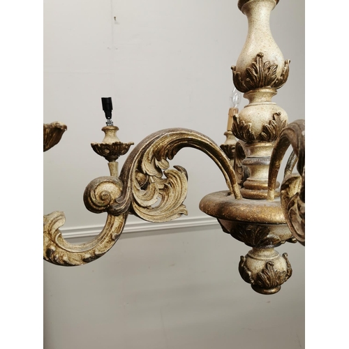 242 - Decorative six branch gilt and painted chandelier { 61cm H X 80cm Dia }.