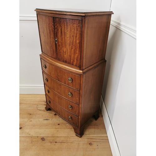 250 - Edwardian mahogany bow fronted tall boy raised on bracket feet {110 cm H x 55 cm W x 46 cm D}.