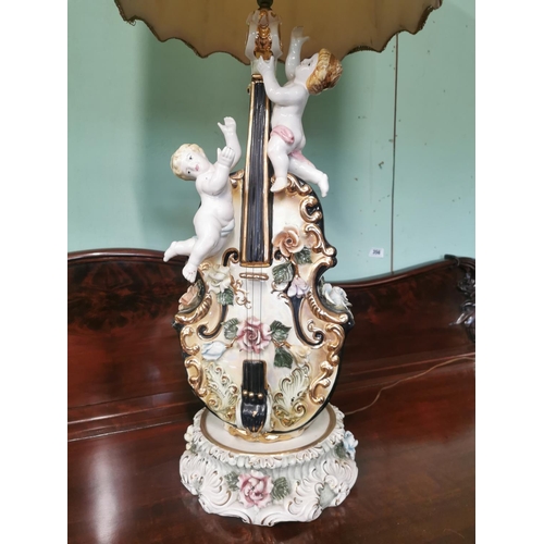 262 - Pair of Italian ceramic table lamps in the form of Cherubs ans violins with shades { 120cm H X 46cm ... 