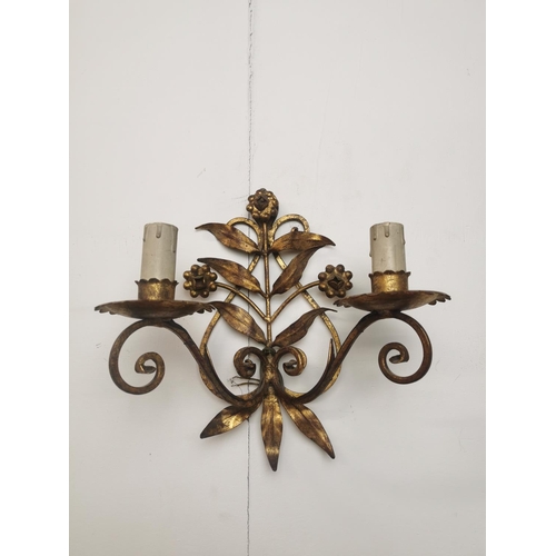 288 - Pair of gilded metal two branch wall sconces { 25cm H X 25cm W X 13cm D }.