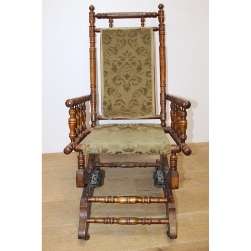 296 - Late 19th. C. American rocking chair with upholstered seat { 103cm H X 54cm W X 52cm D }.