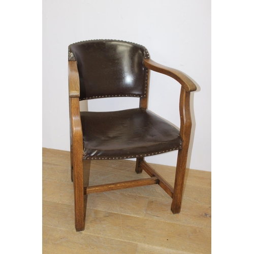 297 - Oak leather upholstered office chair { 82cm H X 56cm W X 46cm D }.