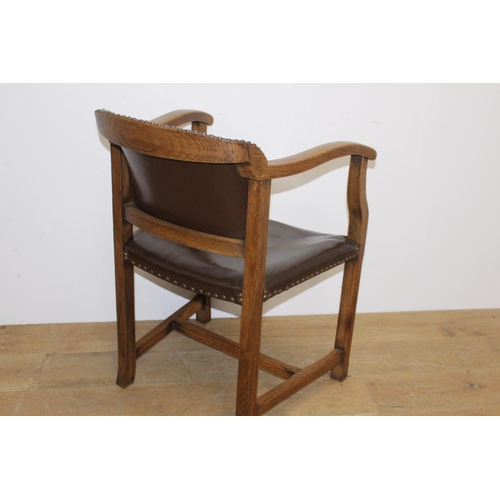 297 - Oak leather upholstered office chair { 82cm H X 56cm W X 46cm D }.