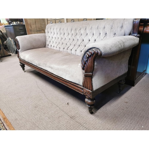 304 - William IV carved mahogany upholstered sofa raised on turned legs with brass casters { 96cm H X 226c... 