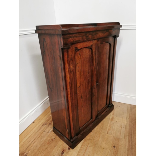 305 - Good quality 19th C. rosewood side cabinet with two panelled doors {104 cm H x 76 cm W x 32 cm D}.