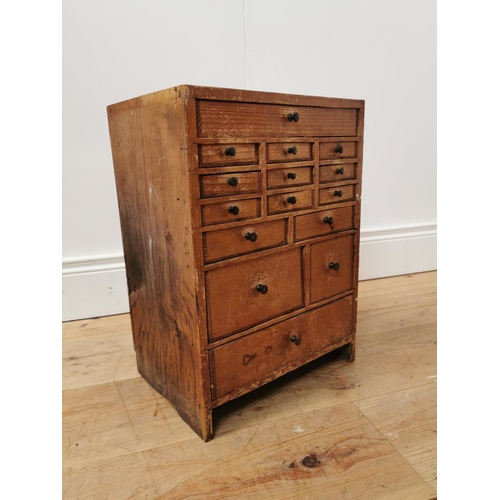 31 - Early 20th. C. pine watch maker's drawers, the long drawer over nine short drawers, four short drawe... 