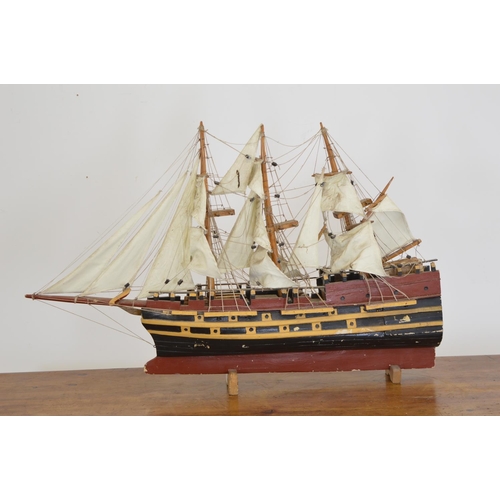 321 - Model of a sailing ship. { 66cm H X 90cm W }.