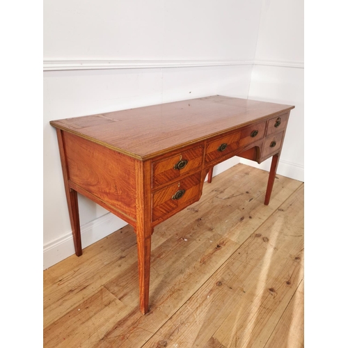 330 - Edwardian satinwood and inlaid desk with central drawer flanked by four short drawers on tapered leg... 