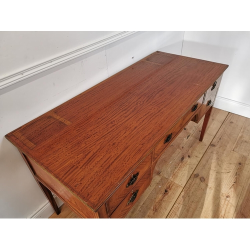 330 - Edwardian satinwood and inlaid desk with central drawer flanked by four short drawers on tapered leg... 