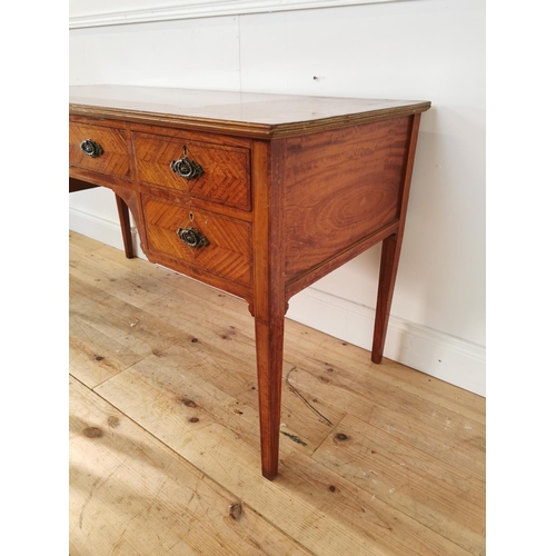 330 - Edwardian satinwood and inlaid desk with central drawer flanked by four short drawers on tapered leg... 