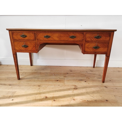 330 - Edwardian satinwood and inlaid desk with central drawer flanked by four short drawers on tapered leg... 