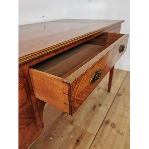 330 - Edwardian satinwood and inlaid desk with central drawer flanked by four short drawers on tapered leg... 