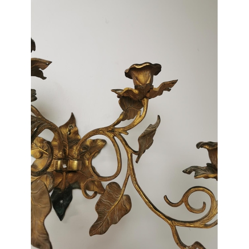 340 - Pair of gilded two branch sconces { 23cm H X 33cm W X 23cm D }.