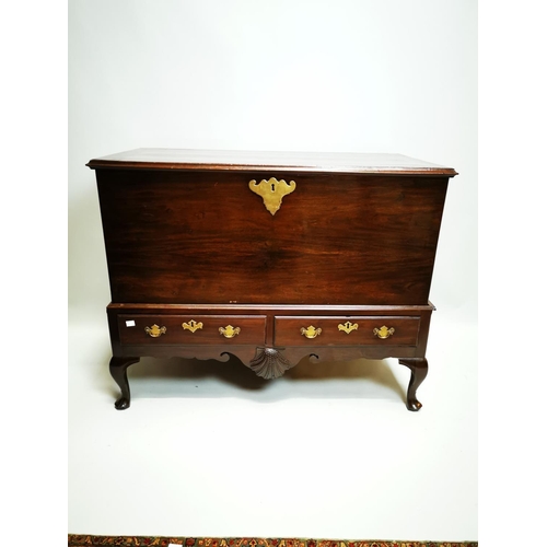 342 - Irish Georgian mahogany chest on stand with two drawers and carved shell in the frieze on cork pad f... 