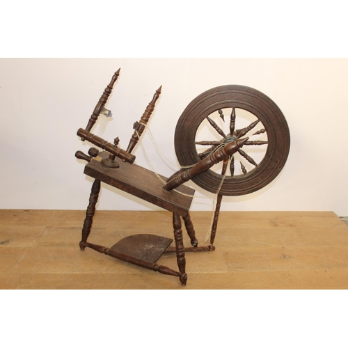 346 - 19th. C. oak spinning wheel { 85cm H X 87cm W X 33cm D }.