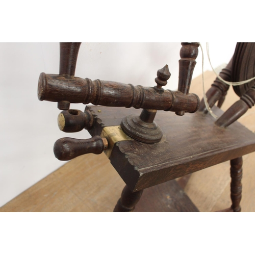 346 - 19th. C. oak spinning wheel { 85cm H X 87cm W X 33cm D }.