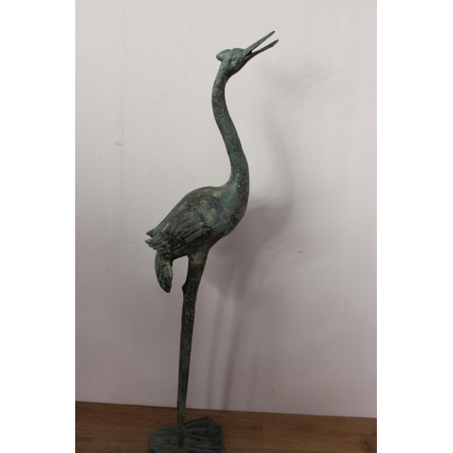 347 - Bronze model of a stork { 142cm H X 28cm W X 30cm D }.