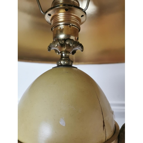 352 - Decorative table lamp in the form of an osrich egg supported by three birds with shade { 65cm H X 43... 