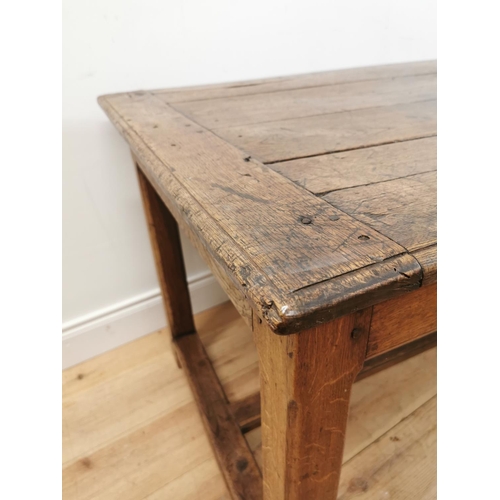 364 - 18th. C. oak kitchen table raised on champhered square legs with single stretcher { 75cm H X 193cm W... 