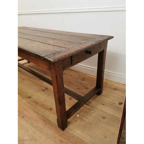 364 - 18th. C. oak kitchen table raised on champhered square legs with single stretcher { 75cm H X 193cm W... 