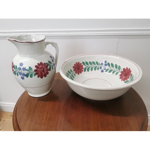 37 - Early 20th. C. ceramic jug and basin set with brushwork decoration { Basin 33cm H X 34cm Dia }