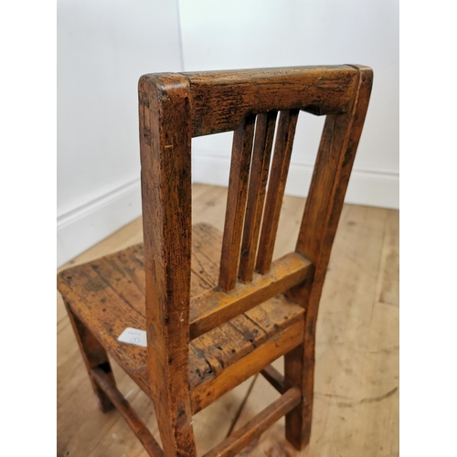 373 - 19th C . Painted pine child's chair raised on square legs. {54 cm H x 28 cm W x 21 cm D}.