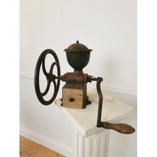 375 - Early 20th C cast iron coffee grinder. { 36 cm H x 44 cm W x 30 cm D}.