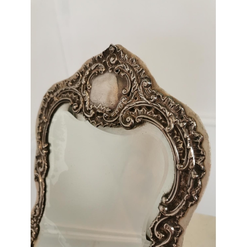 379 - 19th C. decorative silver table mirror. {31 cm H x 24 cm W}.