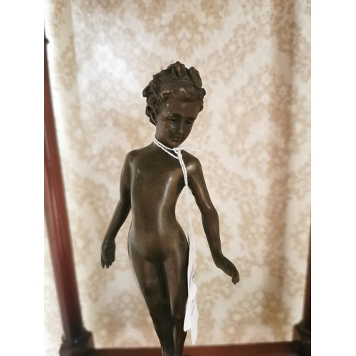 383 - Bronze model of a Young Boy mounted on marble base {33 cm H x 8 cm W}.