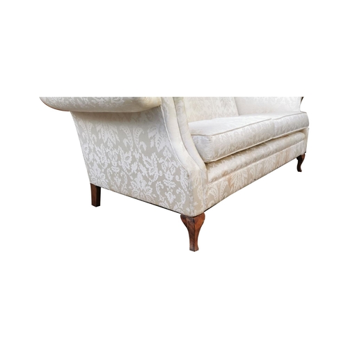 389 - Pair of upholstered two seater camel backed settees raised on cabriole mahogany legs { 88cm H X 172c... 