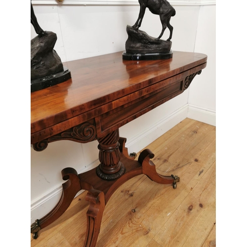 390 - Good quality Regency mahogany turn over leaf tea table raised on turned column and four outswept fee... 