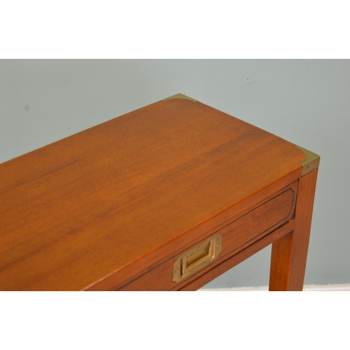 423 - Mahogany console table with brass mounts and two drawers in the frieze raised on square tapered legs... 