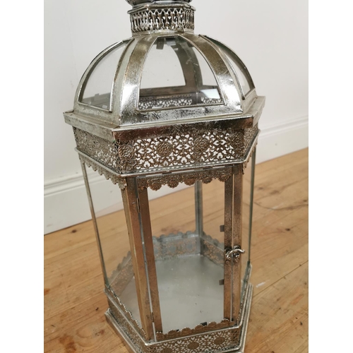 431 - Decorative silvered metal lantern with glass panel. {64 cm H x 26 cm W x 26 cm D}.