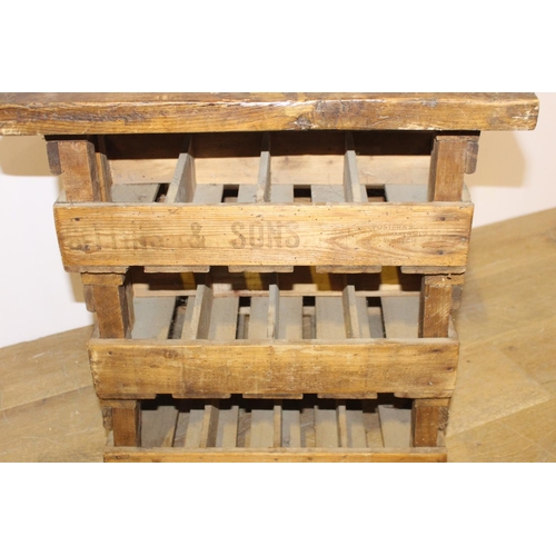 437 - Table in the form of crates { 63cm H X 56cm Sq }.