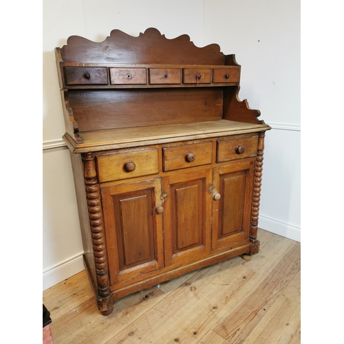 44 - 19th C. pine Scottish kitchen dresser with gallery back and three doors over three blind drawers. {1... 