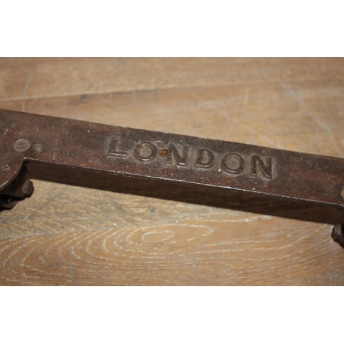 441 - Cast iron piano trolley  - H.C. Slingsby Bradford & London  { 6cm H X 54cm  Dia }.