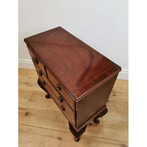 450 - Mahogany and satinwood inlaid side cabinet with two short drawers over two long drawers  raised on c... 