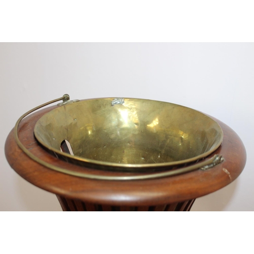 458 - Walnut ice bucket with brass liner { 50cm H X 35cm Dia }.