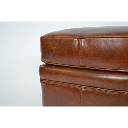 467 - Good quality brown leather upholstered foot stool . { 44cm H X 46cm Sq }.