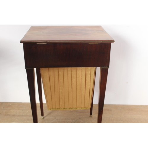 468 - 19th. C. walnut veneered ladies work table the lift up lid enclosing fitted interior above a single ... 