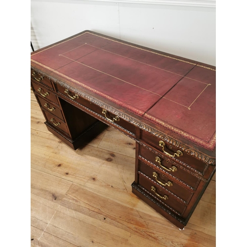 473 - 19th. C. mahogany knee hole desk the tooled leather top above a centre drawer flanked by eight short... 