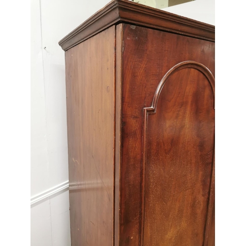49 - 19th C. Mahogany Gentleman's Wardrobe with single arch panel door raised on plinth base {193cm H x 6... 
