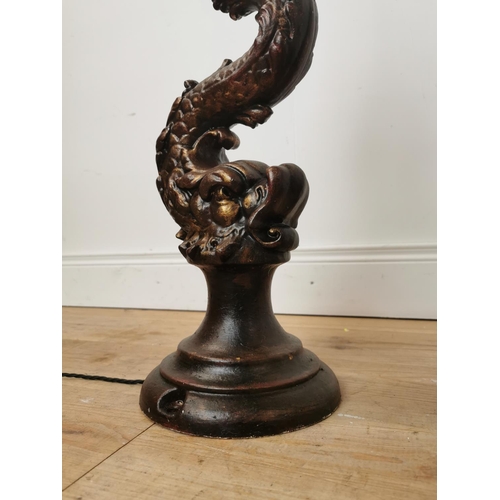 498 - Pair of decorative cast iron lamp bases in the form of mytical fish.  { 80cm H X 22cm Dia }.