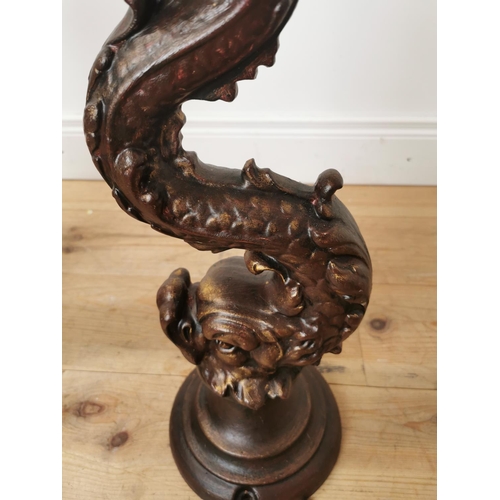 498 - Pair of decorative cast iron lamp bases in the form of mytical fish.  { 80cm H X 22cm Dia }.