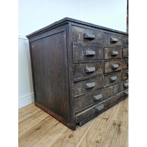 519 - Early 20th C oak bank of fifteen drawers. {100 cm H x 150 cm W x 89 cm D}.