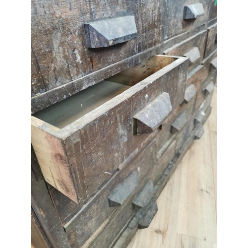 519 - Early 20th C oak bank of fifteen drawers. {100 cm H x 150 cm W x 89 cm D}.