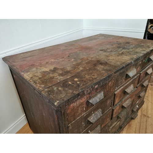 519 - Early 20th C oak bank of fifteen drawers. {100 cm H x 150 cm W x 89 cm D}.