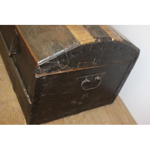 527 - 19th. C. oak leather bound travel trunk with metal hinges { 43cm H X 108cm W X 49cm D }