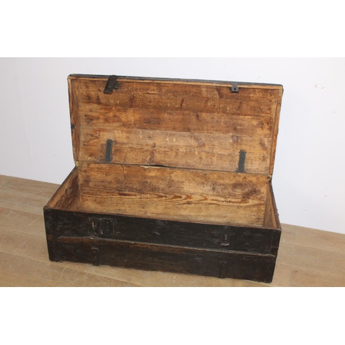 527 - 19th. C. oak leather bound travel trunk with metal hinges { 43cm H X 108cm W X 49cm D }